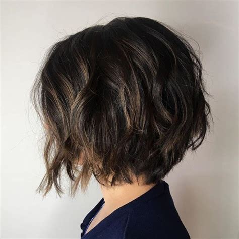 Choppy bob hairstyles for thick hair - 16. Chin-Length Frizzy Wavy Bob Crop. Wear your hair in an all-one-length textured bob and show the world your fun-loving beach-blonde waves. The razored ends and the tousled top with bangs do a wonderful job of providing lift and added texture to flat fine hair.